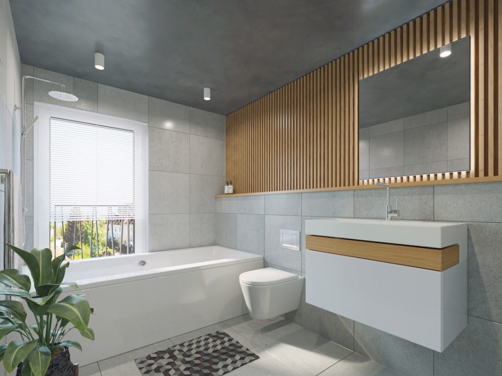 a-bathroom-with-a-toilet-sink-and-bathtub-l4irkkl5dng